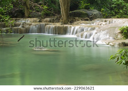 foot spa in waterfall  (Erawan Waterfall)