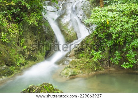 foot spa in waterfall  (Erawan Waterfall)