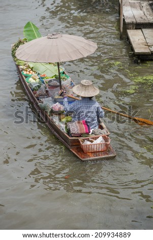 Vendors on boat ,Traditional ways of life in Thailand
