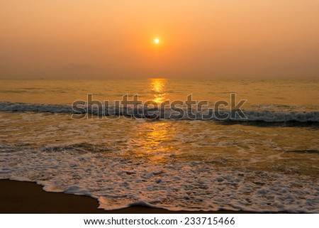 Sun to golden light dawn in the beautiful sea