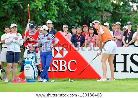SINGAPORE - MARCH 2: USA player Brittany Lang taking an aim at HSBC Women\'s Champions at Sentosa Golf Club Serapong Course March 2, 2013 in Singapore