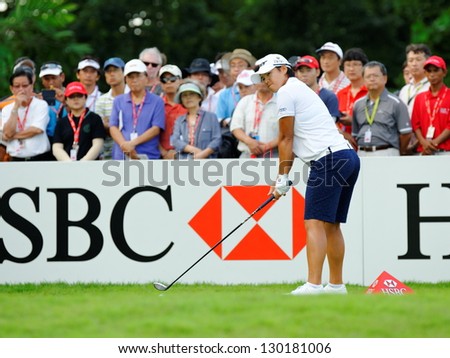 SINGAPORE - MARCH 2: Taiwanese player Yani Tseng taking an aim at HSBC Women\'s Champions at Sentosa Golf Club Serapong Course March 2, 2013 in Singapore