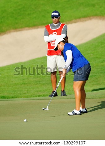SINGAPORE - MARCH 2: American Lizette Salas putting at the green during HSBC Women's Champions at Sentosa Golf Club Serapong Course March 2, 2013 in Singapore