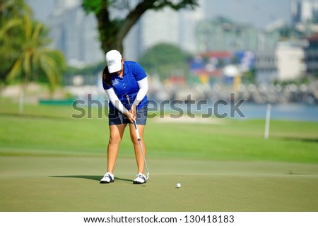 SINGAPORE - MARCH 2: American Lizette Salas putting at the green during HSBC Women's Champions at Sentosa Golf Club Serapong Course March 2, 2013 in Singapore