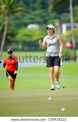 SINGAPORE - MARCH 2: Korean Amy Yang walking on the green during HSBC Women\'s Champions at Sentosa Golf Club Serapong Course March 2, 2013 in Singapore