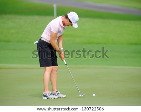 SINGAPORE - MARCH 3: Catriona Matthew putting at the green during HSBC Women\'s Champions at Sentosa Golf Club Serapong Course March 3, 2013 in Singapore