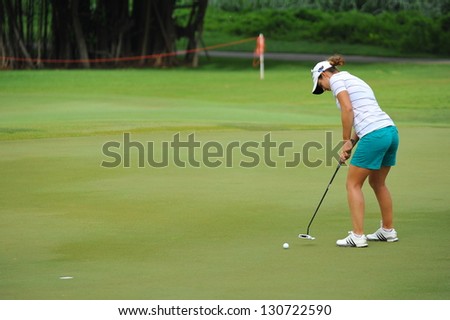 SINGAPORE - MARCH 3: Beatriz Recari putting at the green during HSBC Women's Champions at Sentosa Golf Club Serapong Course March 3, 2013 in Singapore