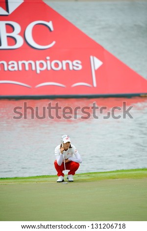 SINGAPORE - MARCH 3: Korean Na Yeon Choi studying hole 18 during HSBC Women\'s Champions at Sentosa Golf Club Serapong Course March 3, 2013 in Singapore