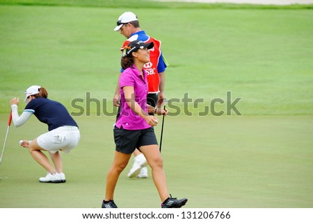 SINGAPORE - MARCH 3: American Danielle Kang happy with the game during HSBC Women's Champions at Sentosa Golf Club Serapong Course March 3, 2013 in Singapore