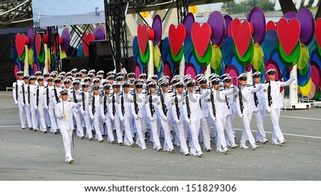 SINGAPORE - JULY 20: Republic of Singapore Navy guard-of-honor contingent marching past during National Day Parade (NDP) Rehearsal 2013 on July 20, 2013 in Singapore
