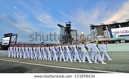 SINGAPORE - JULY 20: Republic of Singapore Navy guard-of-honor contingent marching past during National Day Parade (NDP) Rehearsal 2013 on July 20, 2013 in Singapore