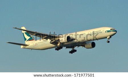 SINGAPORE - MAY 14: Cathay Pacific Boeing 777 landing at Changi Airport on May 14, 2013 in Singapore