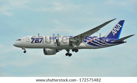 SINGAPORE - DECEMBER 25:  First Boeing 787 (Dreamliner) of All Nippon Airways (ANA) fleet landing at Changi Airport on December 25, 2013 in Singapore