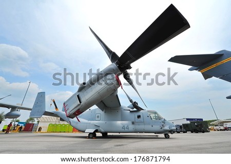 SINGAPORE - FEBRUARY 9: Bell Boeing MV-22 Osprey tilt rotor aircraft with vertical take-off and landing (VTOL) capability on display at Singapore Airshow February 9, 2014 in Singapore