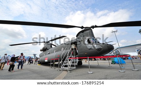 SINGAPORE - FEBRUARY 12: Republic of Singapore Air Force (RSAF) CH-47 Chinook twin rotors helicopter on display at Singapore Airshow February 12, 2014 in Singapore