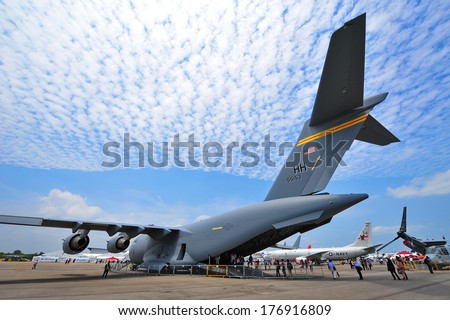 SINGAPORE - FEBRUARY 12: USAF Boeing C-17 Globemaster III cargo aircraft on display at Singapore Airshow February 12, 2014 in Singapore