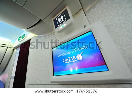 SINGAPORE - FEBRUARY 12: Welcome screen and lavatory signage onboard Qatar Airways Boeing 787-8 Dreamliner at Singapore Airshow February 12, 2014 in Singapore