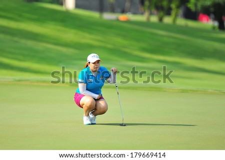 SINGAPORE - MARCH 2: Korean player Inbee Park aiming at the green during HSBC Women\'s Champions at Sentosa Golf Club Serapong Course March 2, 2014 in Singapore