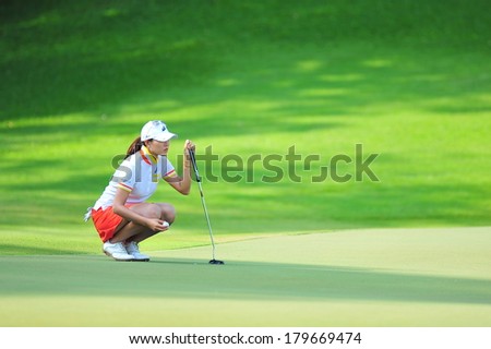 SINGAPORE - MARCH 2: Korean Player Hee Kyung Seo aiming at the green during HSBC Women\'s Champions at Sentosa Golf Club Serapong Course March 2, 2014 in Singapore