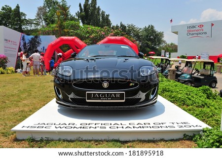 SINGAPORE - MARCH 2: Sponsor Jaguar showcasing its XKR sport coupe during HSBC Women\'s Champions at Sentosa Golf Club Serapong Course March 2, 2014 in Singapore