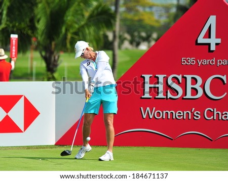 SINGAPORE - MARCH 2: Australian player Karrie Webb teeing off at hole 4 during HSBC Women\'s Champions at Sentosa Golf Club Serapong Course March 2, 2014 in Singapore