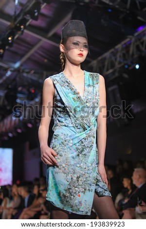 Singapore - May 15: Model showcasing designs from Ashley Isham at Audi Fashion Festival 2014 on May 15, 2014 in Singapore
