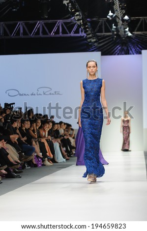 Singapore - May 18: Model showcasing fall collection from Oscar de la Renta at Audi Fashion Festival 2014 on May 18, 2014 in Singapore