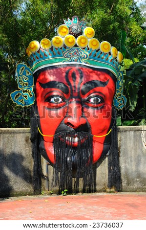 Big Chinese opera painted mask on the wall