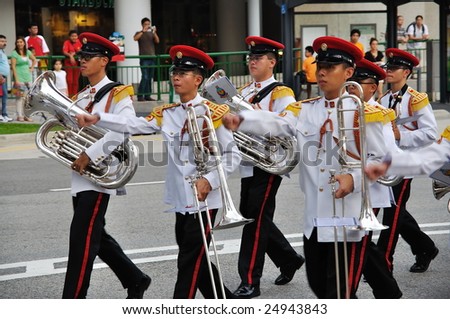 SINGAPORE - DECEMBER 07: Singapore Armed Forces Band B marching during President\'s changing of guards parade December 07, 2008 in Singapore