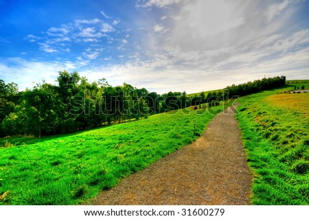 High dynamic range photo of grass field and blue sky