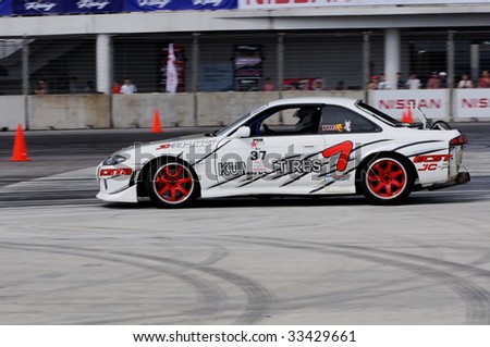 stock photo SINGAPORE JULY 05 Aris drifting during Formula Drift 