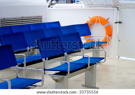 Blue seats on board ferry