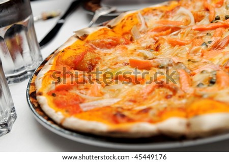 Traditional Italian thin crust pizza with sausage toppings