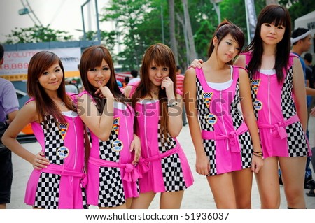 SINGAPORE - APRIL 24: Group of race queens posing at Singapore Formula Drift at F1 Pit Building April 24, 2010 in Singapore.
