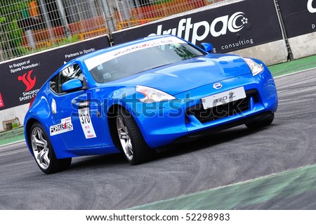 stock photo SINGAPORE APRIL 25 New Nissan 370Z coupe parading at 