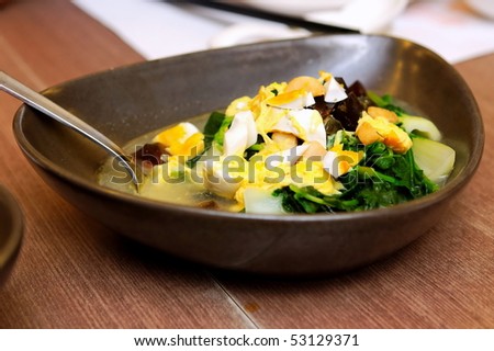 Boiled vegetable with century eggs