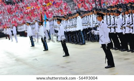 SINGAPORE - JULY 03: Guard-of-honor contingents standing at attention during National Day Parade Combined Rehearsal July 03, 2010 in Singapore