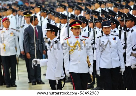 SINGAPORE - JULY 03: Guard-of-honor inspection during National Day Parade Combined Rehearsal July 03, 2010 in Singapore