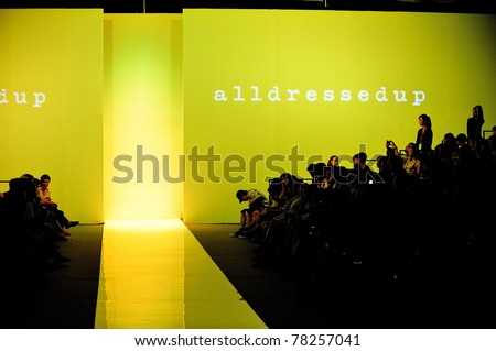 SINGAPORE - MAY 17: alldressedup backdrop and spectator gallery at Audi Fashion Festival 2011 alldressedup Show on May 17, 2011 in Singapore.
