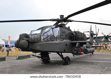 SINGAPORE - MAY 28: Static display of Republic of Singapore Air Force (RSAF) Apache AH-64 helicopter during RSAF Open House 2011 on May 28, 2011 in Singapore.