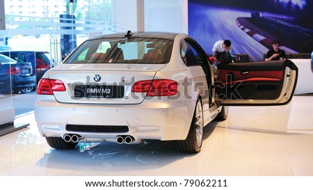 SINGAPORE - MAY 21: Static display of BMW M3 sports coupe at Munich Automobiles BMW Service Centre Open House on May 21, 2011 in Singapore