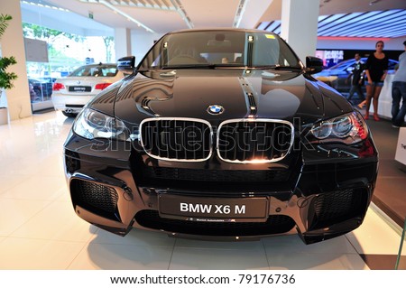 SINGAPORE - MAY 21: Static display of BMW X6 M at Munich Automobiles BMW Service Centre Open House on May 21, 2011 in Singapore