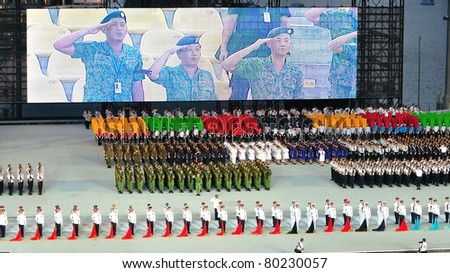 SINGAPORE - JUNE 18: Uniformed groups standing at attention at National Day Parade Singapore 2011 Combined Rehearsal on June 18, 2011 in Singapore.