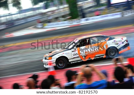 SINGAPORE - JUNE 12: Kenshiro Gushi drifting at Formula Drift Singapore 2011 on June 12, 2011 in Singapore.