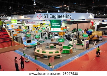 SINGAPORE - FEBRUARY 12: ST Engineering booth showing off its technology and defense systems at Singapore Airshow February 12, 2012 in Singapore