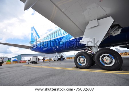 SINGAPORE - FEBRUARY 12: Landing gears and rear of the new Boeing  at Singapore Airshow February 12, 2012 in Singapore