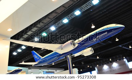 SINGAPORE - FEBRUARY 12: Model of low emission and fuel efficient Boeing 787 Dreamliner on display at Singapore Airshow February 12, 2012 in Singapore