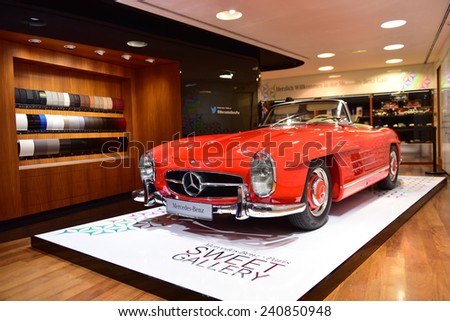 PARIS - SEPTEMBER 24: Red classic 300 SL on display at the Mercedes Benz gallery along Champ Elysees, taken on September 24, 2014 in Paris, France