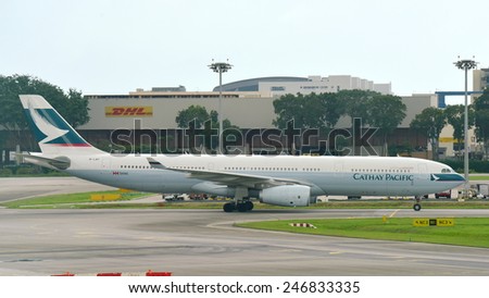 SINGAPORE - JANUARY 10: Cathay Pacific Airbus 330 taxiing at Changi Airport on January 10, 2015 in Singapore