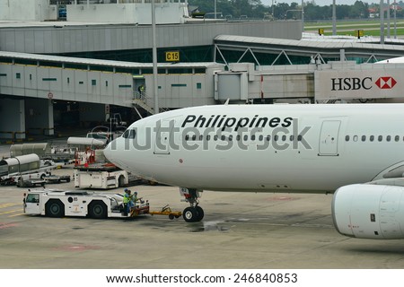 SINGAPORE - JANUARY 10: Philippines Airlines Airbus 330 being pushed back at Changi Airport on January 10, 2015 in Singapore